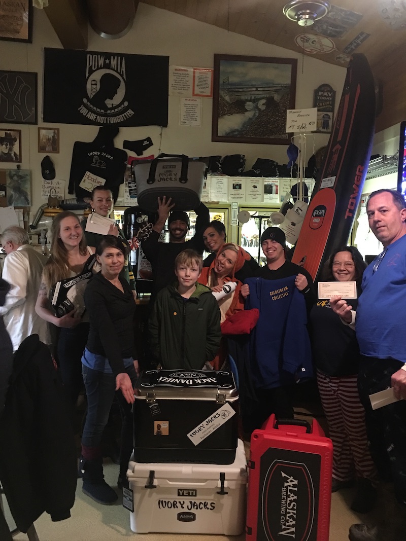 The happy winners of various prizes from Superbowl Sunday